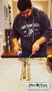 A man named Anthony working on a table