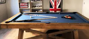 A pool table with a british flag