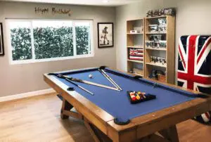 A pool table with a british flag