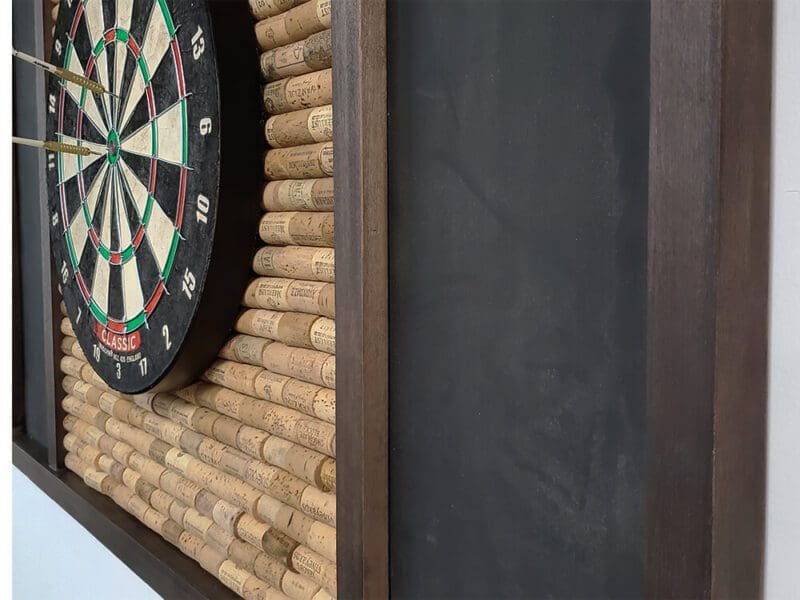 Dart backboard with wine cork close up side view comp