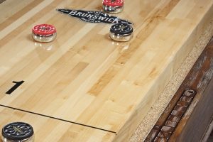 Canton shuffleboard pucks scoring closeup 2