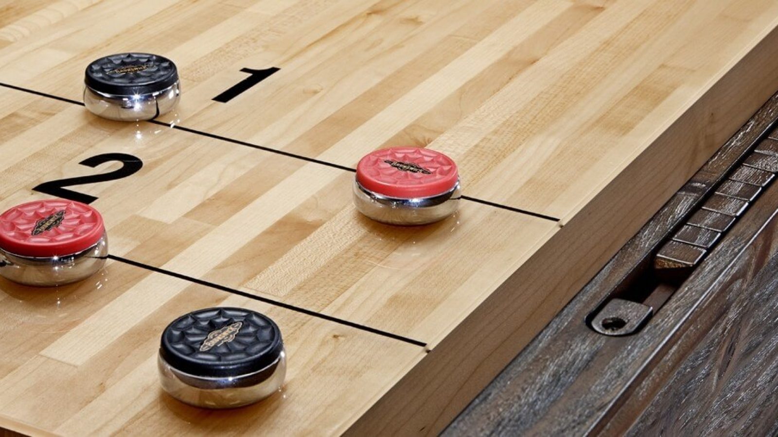 Canton shuffleboard pucks scoring closeup