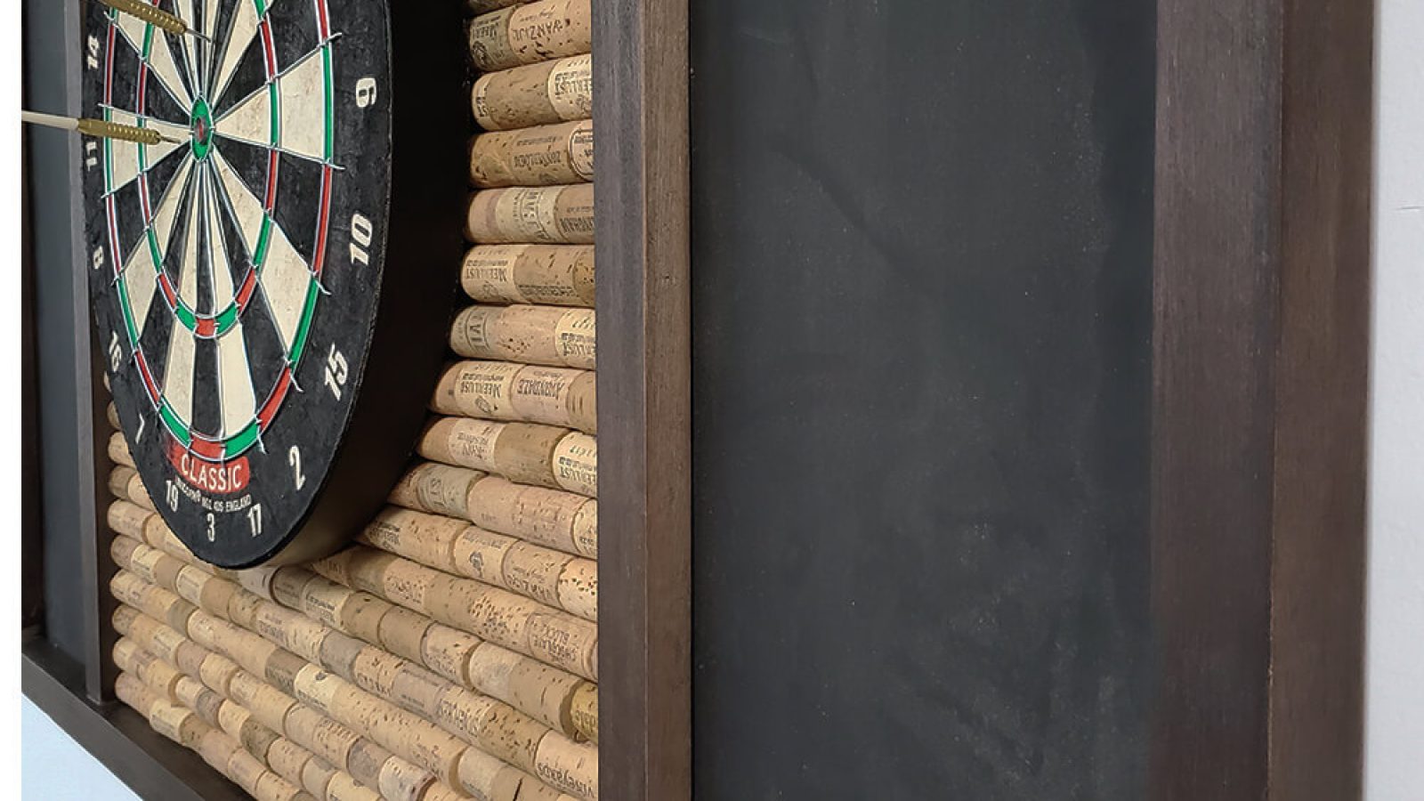 Dart backboard with wine cork close up side view comp